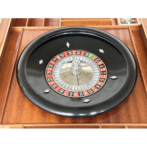 320 - GAMES TABLE, Italian marquetry incorporating a roulette wheel, backgammon and chequerboard, 75cm H x... 