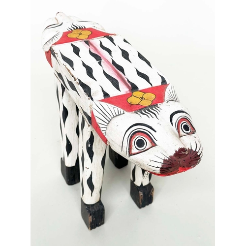 35 - TIGER STOOL, tribal style painted and carved, 50cm W.