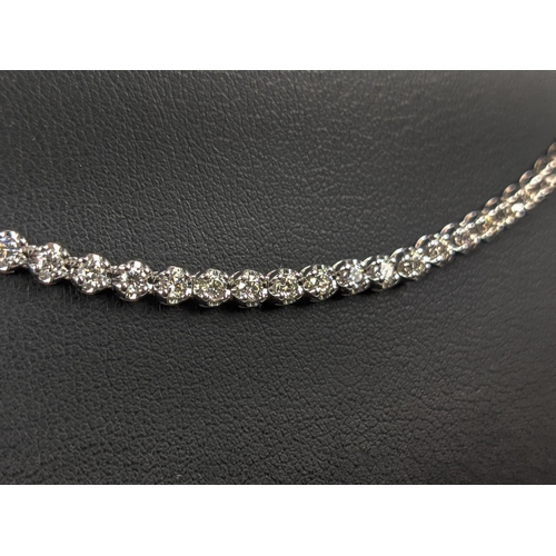 43 - AN 18CT WHITE GOLD DIAMOND SET NECKLACE, set with approximately 140 round brilliant cut diamonds, to... 