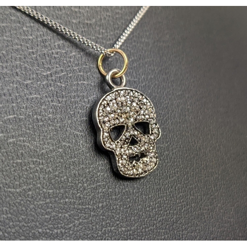 45 - A SILVER AND DIAMOND SET SKULL PENDANT, Italian silver chain, 46cm long, complete with box.