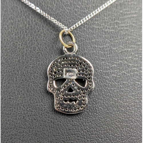 45 - A SILVER AND DIAMOND SET SKULL PENDANT, Italian silver chain, 46cm long, complete with box.