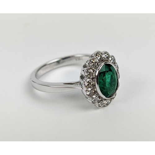 49 - AN 18CT WHITE GOLD EMERALD AND DIAMOND DRESS RING, the central emerald of approximately 1.60 carats,... 