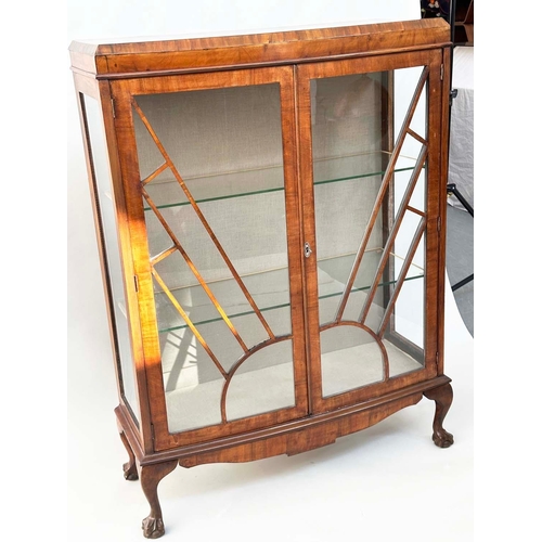 533 - ART DECO DISPLAY CASE, figured walnut with two arched glazed doors enclosing shelves, 120cm H x 93cm... 