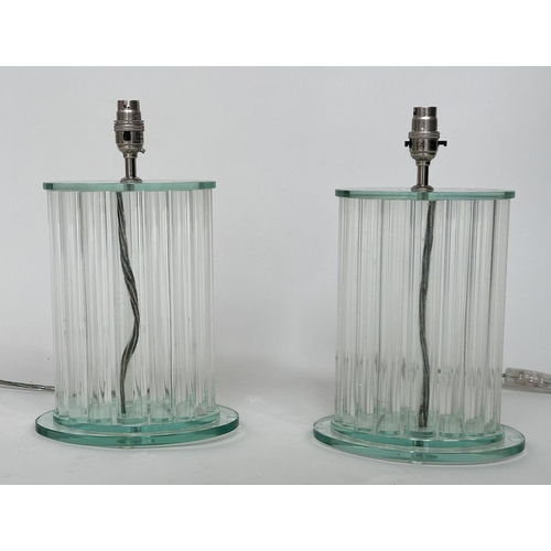 545 - TABLE LAMPS BY GREEN APPLE, a pair, glass oval each with twenty graduated glass column supports, 37c... 