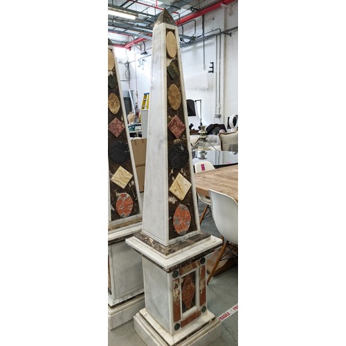 335 - MARBLE OBELISKS, a pair, large scale with various  stone applied decoration 182cm H x 40cm W. (2)