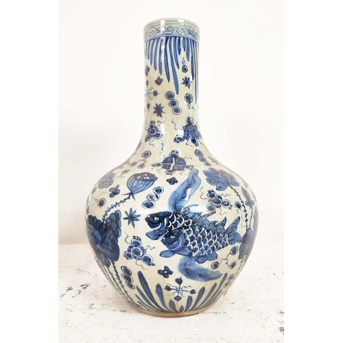 336 - BOTTLE VASES, a pair, Chinese style blue and white ceramic, 60cm H x 38cm W. (2)