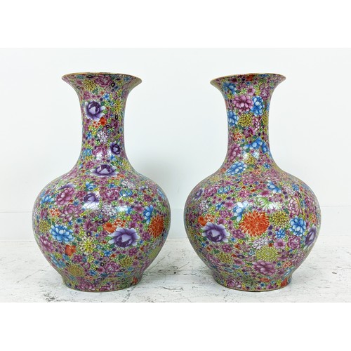 337 - VASES, a pair, floral decorated ceramic, 55cm H x 40cm W. (20