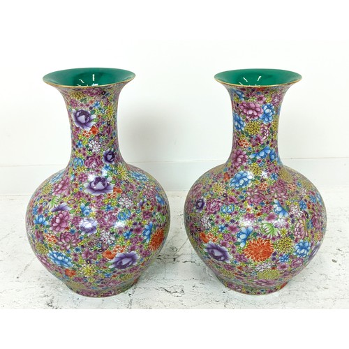 337 - VASES, a pair, floral decorated ceramic, 55cm H x 40cm W. (20