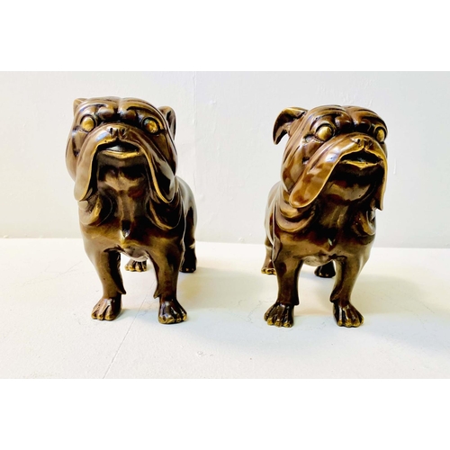 357 - SCULPTURAL BULLDOGS, a pair, in bronze, 29cm H x 38cm L (2)