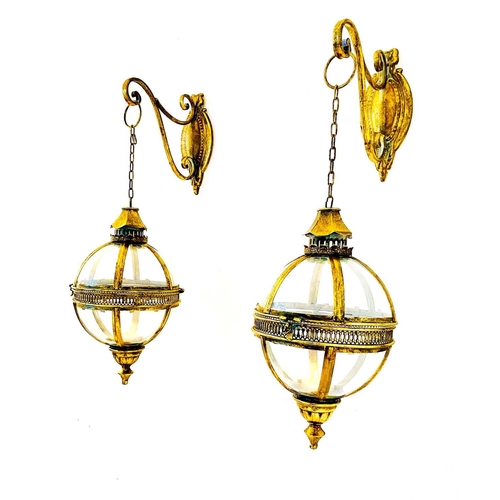 349 - WALL HANGING GLOBE CANDLE LANTERNS, a pair, Regency style gilt metal, 80cm H x 25cm. (2)