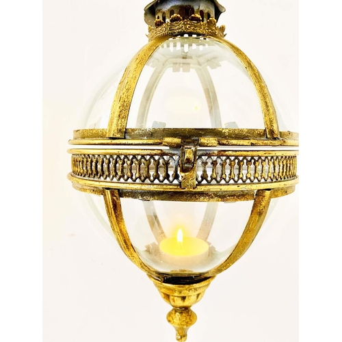 349 - WALL HANGING GLOBE CANDLE LANTERNS, a pair, Regency style gilt metal, 80cm H x 25cm. (2)