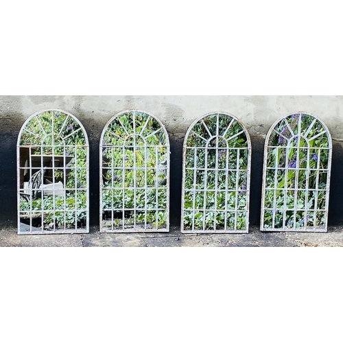 348 - ARCHITECTURAL GARDEN WALL MIRRORS, a set of four, distressed metal arched frames, 60cm H x 36cm. (4)