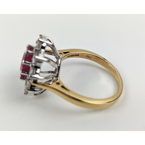 40 - AN 18CT GOLD RUBY AND DIAMOND CLUSTER RING, the central mixed cut ruby of approximately 2.25 carats,... 