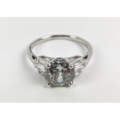 42 - AN 18CT WHITE GOLD DIAMOND SOLITAIRE RING, with baguette cut diamonds to shoulders, the central roun... 