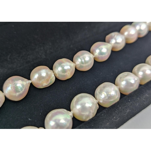 49 - CULTURED PEARL SINGLE STRAND NECKLACE, each pearl of round irregular form, 8mm diam approx, 14ct gol... 