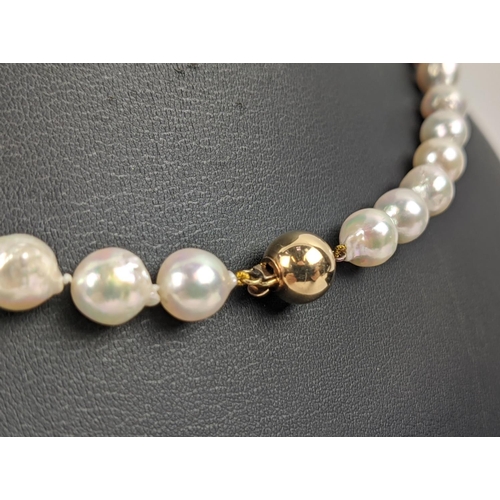 49 - CULTURED PEARL SINGLE STRAND NECKLACE, each pearl of round irregular form, 8mm diam approx, 14ct gol... 