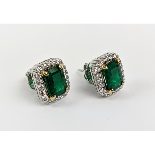 39 - A PAIR OF 18CT WHITE GOLD EMERALD AND DIAMOND STUD EARRINGS, step cut emeralds of approximately 3.23... 