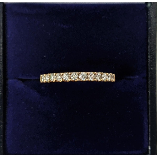 53 - AN 18CT GOLD DIAMOND HALF ETERNITY RING, set with twelve round brilliant cut diamonds, ring size M, ... 