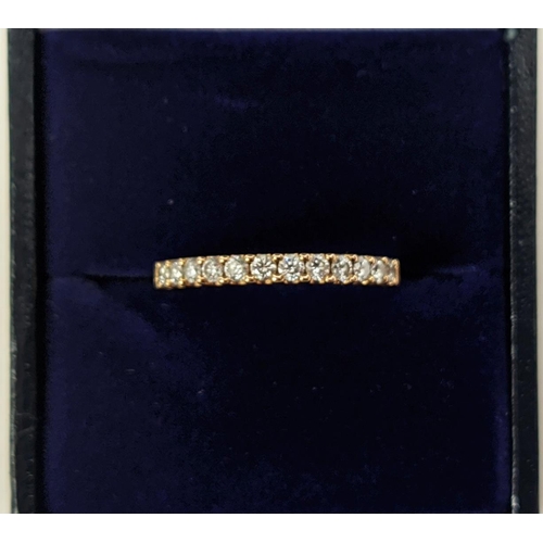 53 - AN 18CT GOLD DIAMOND HALF ETERNITY RING, set with twelve round brilliant cut diamonds, ring size M, ... 