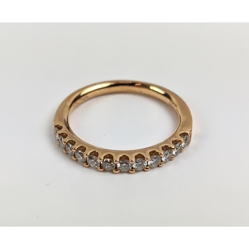 53 - AN 18CT GOLD DIAMOND HALF ETERNITY RING, set with twelve round brilliant cut diamonds, ring size M, ... 