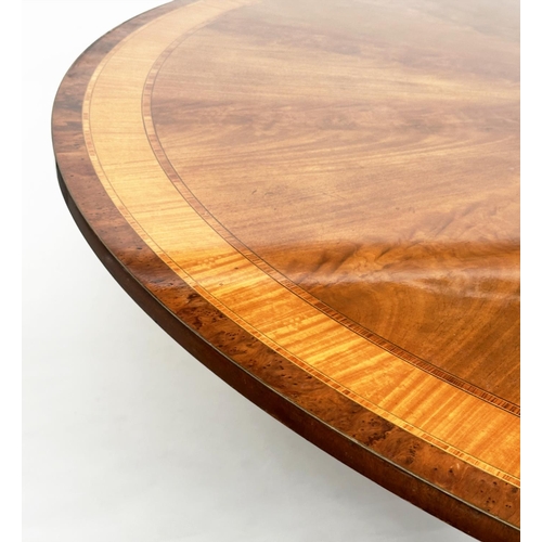 100 - DINING TABLE, circular Regency style radially veneered mahogany and satinwood crossbanded with outsw... 