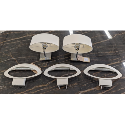 315 - ARTEMIDE MESMERI WALL LIGHTS, a set of three, by Eric Solè, 25cm H x 34cm W, together with a pair of... 