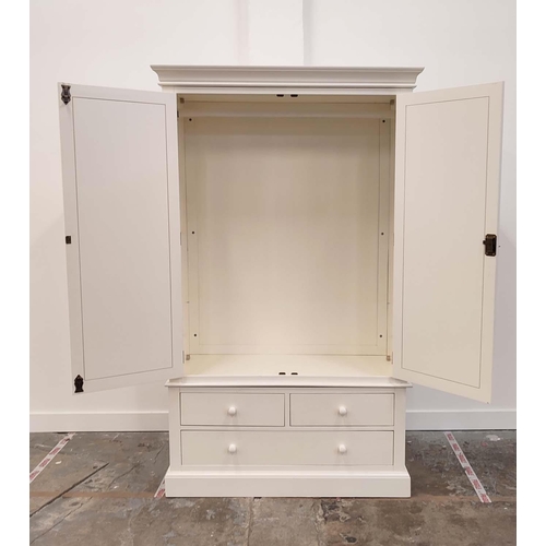 272 - WARDROBE, in a white finish with two doors, hanging rail and three drawers 125cm W x 57cm D x 205cm ... 