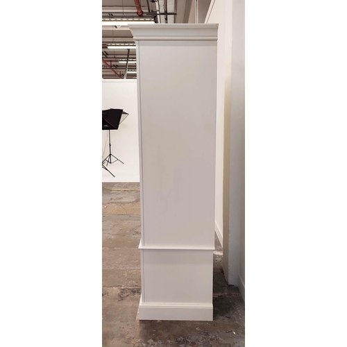 272 - WARDROBE, in a white finish with two doors, hanging rail and three drawers 125cm W x 57cm D x 205cm ... 