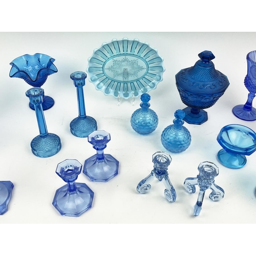 10 - QUANTITY OF BLUE URANIUM GLASS, comprising four pairs of candlesticks, two pairs of icecream bowls, ... 