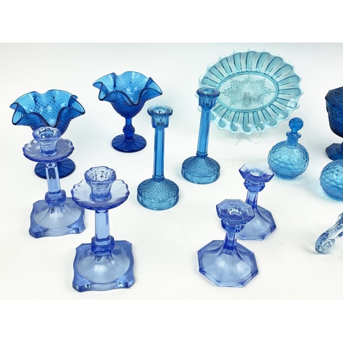 10 - QUANTITY OF BLUE URANIUM GLASS, comprising four pairs of candlesticks, two pairs of icecream bowls, ... 