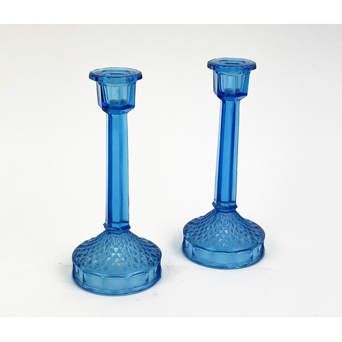 10 - QUANTITY OF BLUE URANIUM GLASS, comprising four pairs of candlesticks, two pairs of icecream bowls, ... 