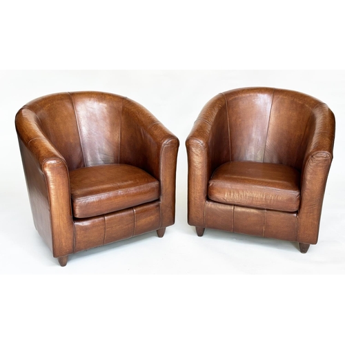 114 - TUB ARMCHAIRS, a pair, natural soft mid brown leather upholstered with rounded backs, 78cm W. (2)