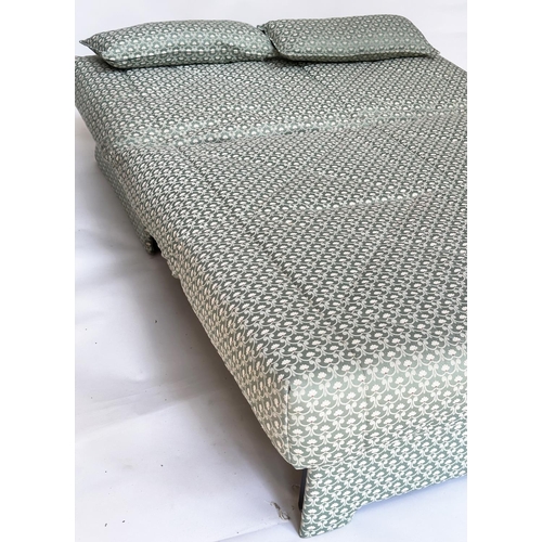 125 - SOFA BED, geometric print upholstered with cushion, transferring to bed, 142cm W (180cm extended).