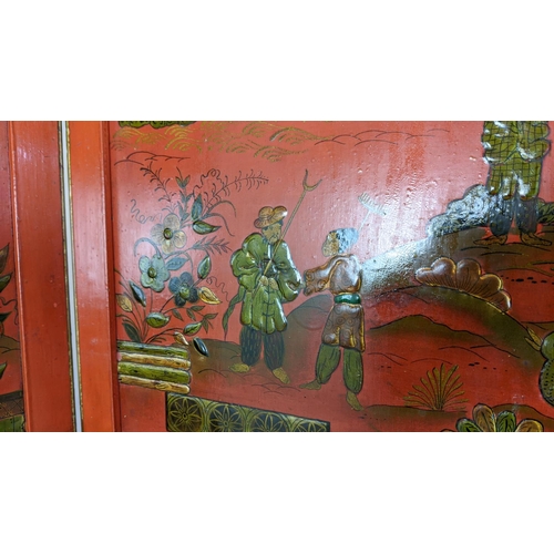 177 - CHINOISERIE SCREEN, early 20th century red lacquer, three fold, each panel 178cm x 46cm W, with gilt... 