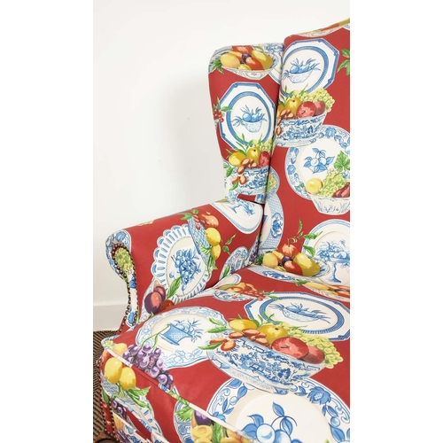 210 - WING ARMCHAIR, Queen Anne style in Jane Churchill fruit bowl patterned fabric, 117cm H x 82cm.