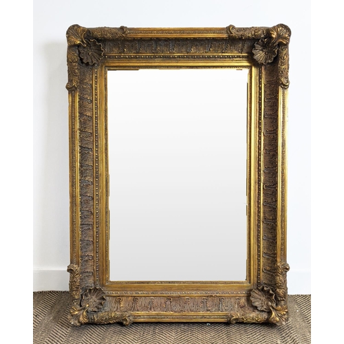 212 - WALL MIRROR, 19th century style gilt framed with shell and leaf decoration, 121cm x 88cm.