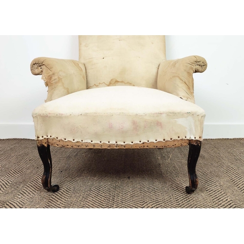 214 - BERGERE, Napoleon III ebonised with deconstructed frame, old calico upholstery and wood castors.