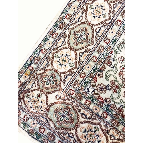 79 - FINE PURE SILK HEREKE DESIGN CARPET, 270cm x 180cm.