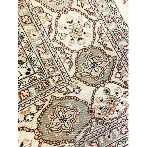 79 - FINE PURE SILK HEREKE DESIGN CARPET, 270cm x 180cm.