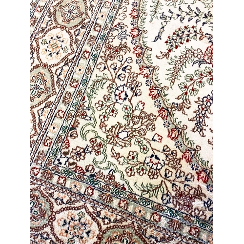 79 - FINE PURE SILK HEREKE DESIGN CARPET, 270cm x 180cm.