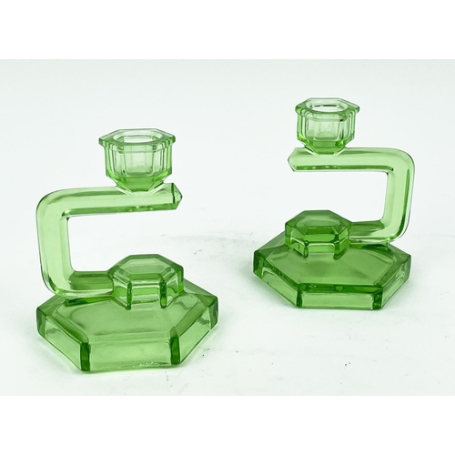 9 - QUANTITY OF GREEN URANIUM GLASS, three pairs of candlesticks, a large figural vase, a mermaid tray, ... 