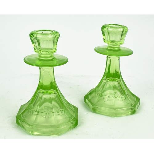 9 - QUANTITY OF GREEN URANIUM GLASS, three pairs of candlesticks, a large figural vase, a mermaid tray, ... 