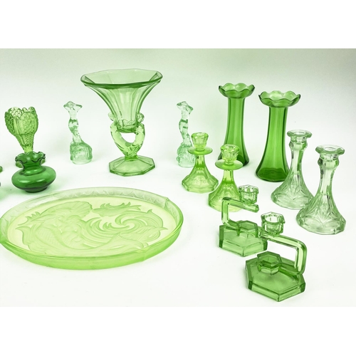 9 - QUANTITY OF GREEN URANIUM GLASS, three pairs of candlesticks, a large figural vase, a mermaid tray, ... 