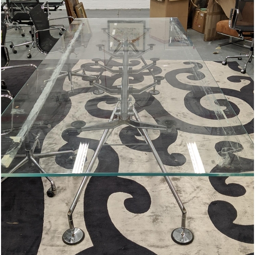 397 - NOMOS TABLE, with a rectangular glass top on pad footed base, 300cm L x 120cm D.