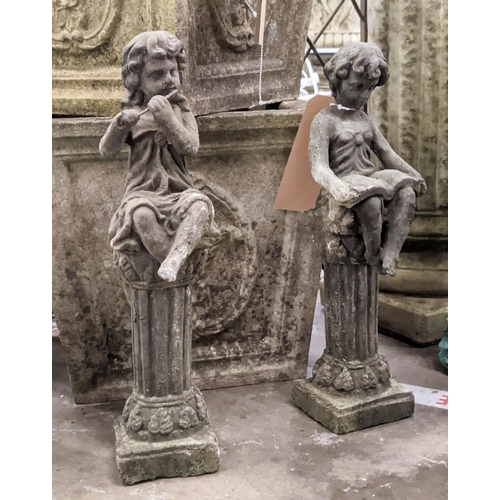 522 - TWO CAST METAL FIGURINES ATOP COLUMNS, each 41cm H. (2)