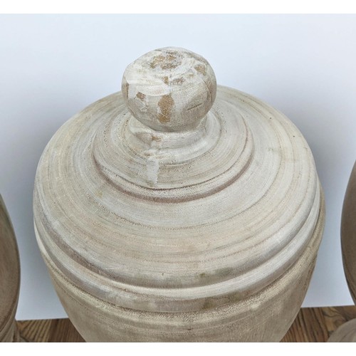 520 - WOODEN LIDDED JARS, a set of four, 43.5cm H x 24.5cm. (4)