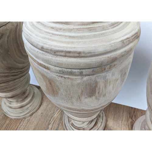 520 - WOODEN LIDDED JARS, a set of four, 43.5cm H x 24.5cm. (4)