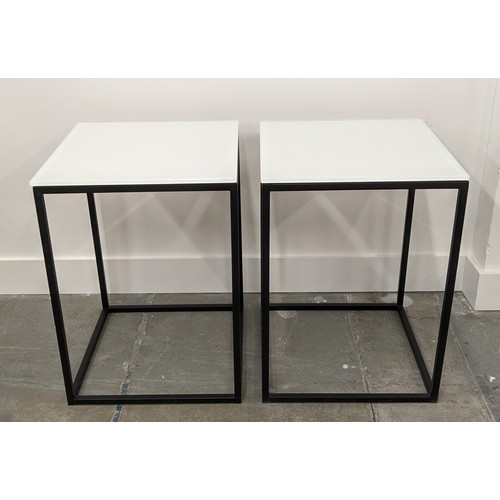 589 - SIDE TABLES, a pair, 40cm x 40cm x 55cm, frosted glass tops, on black painted metal supports. (2)