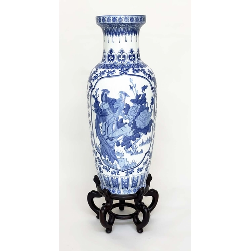 104 - PEACOCK VASE ON STAND, large Chinese ceramic blue and white peacock vase on carved wood stand, 77cm ... 