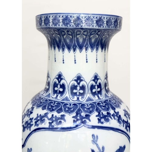 104 - PEACOCK VASE ON STAND, large Chinese ceramic blue and white peacock vase on carved wood stand, 77cm ... 